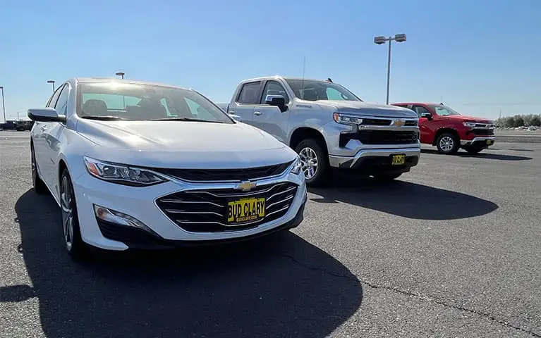 Lineup of Chevy vehicles outside of Bud Clary Chevrolet of Moses Lake