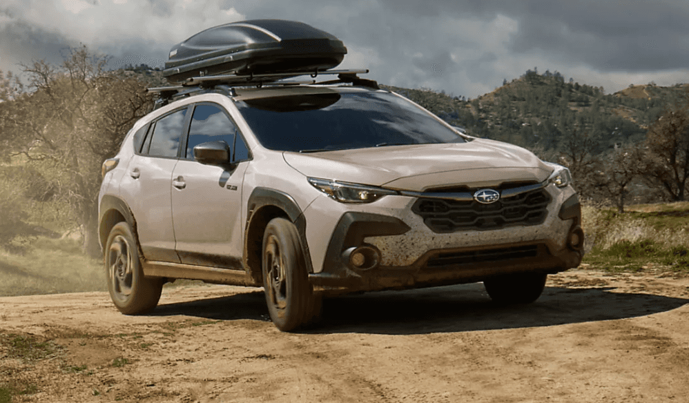 2026-Crosstrek-Hybrid--Sand-Dune-Pearl--Front-and-Side-View-Exterior