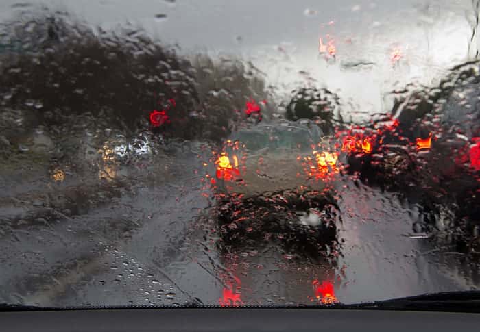 Car driving in rain