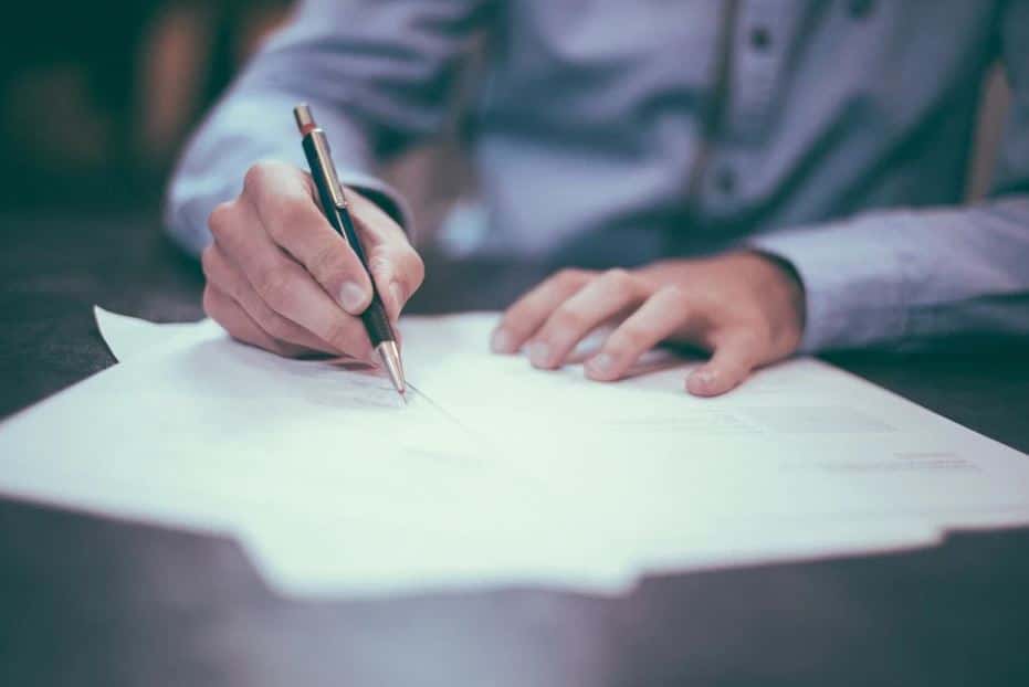 Person Signing Lease Paperwork