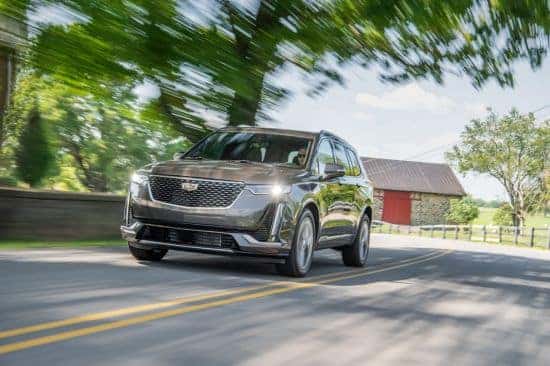 An exterior shot of a crossover and a sedan