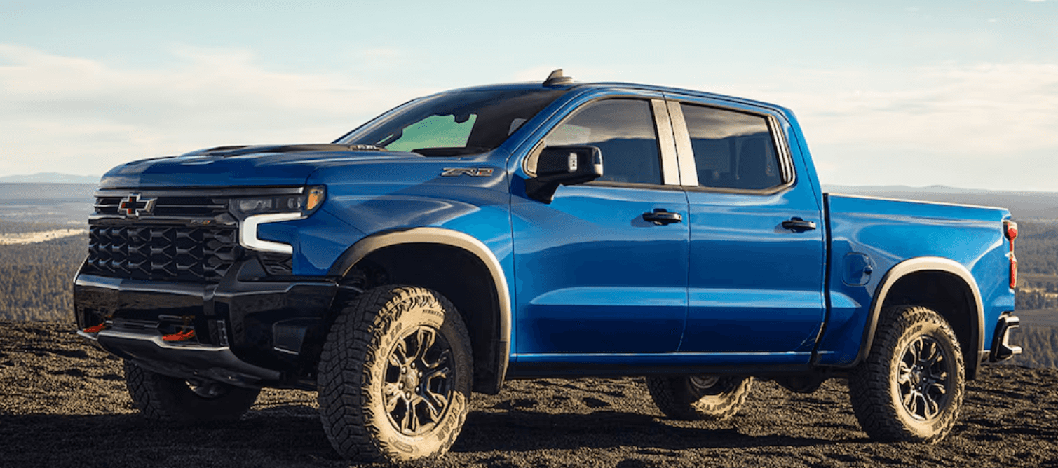 Chevy Silverado Parked in Dirt Field