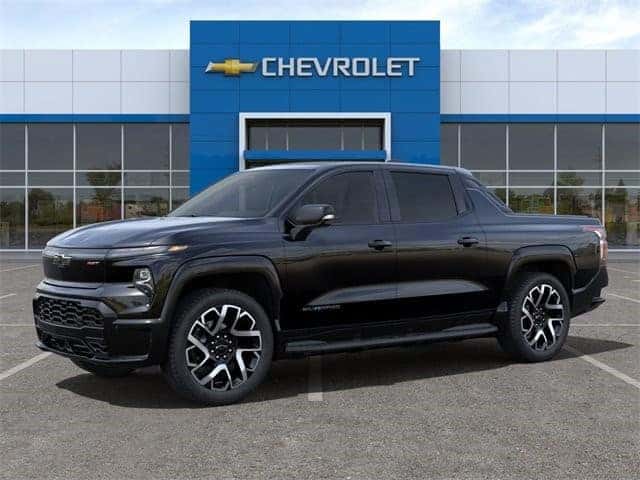 New 2024 Chevrolet Silverado EV parked outside dealership