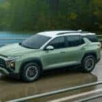 2026 Chevy Equinox driving across a bridge
