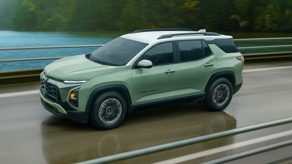 2026 Chevy Equinox driving over a river