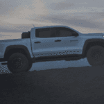 Side view of the 2024 Chevrolet Colorado ZR2 with mountains in the background