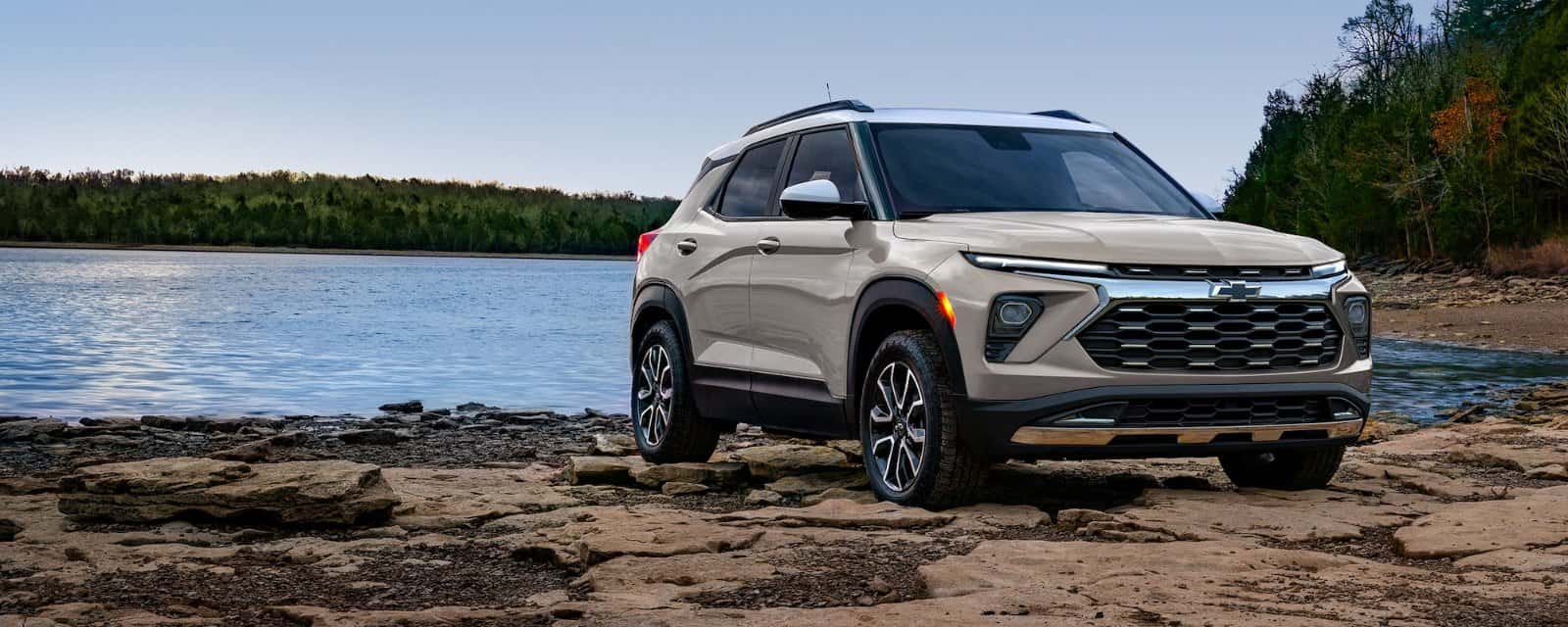 2026 Chevrolet Trailblazer compact SUV parked on rocky terrain beside a lake near Denver, Colorado (official Chevrolet image)