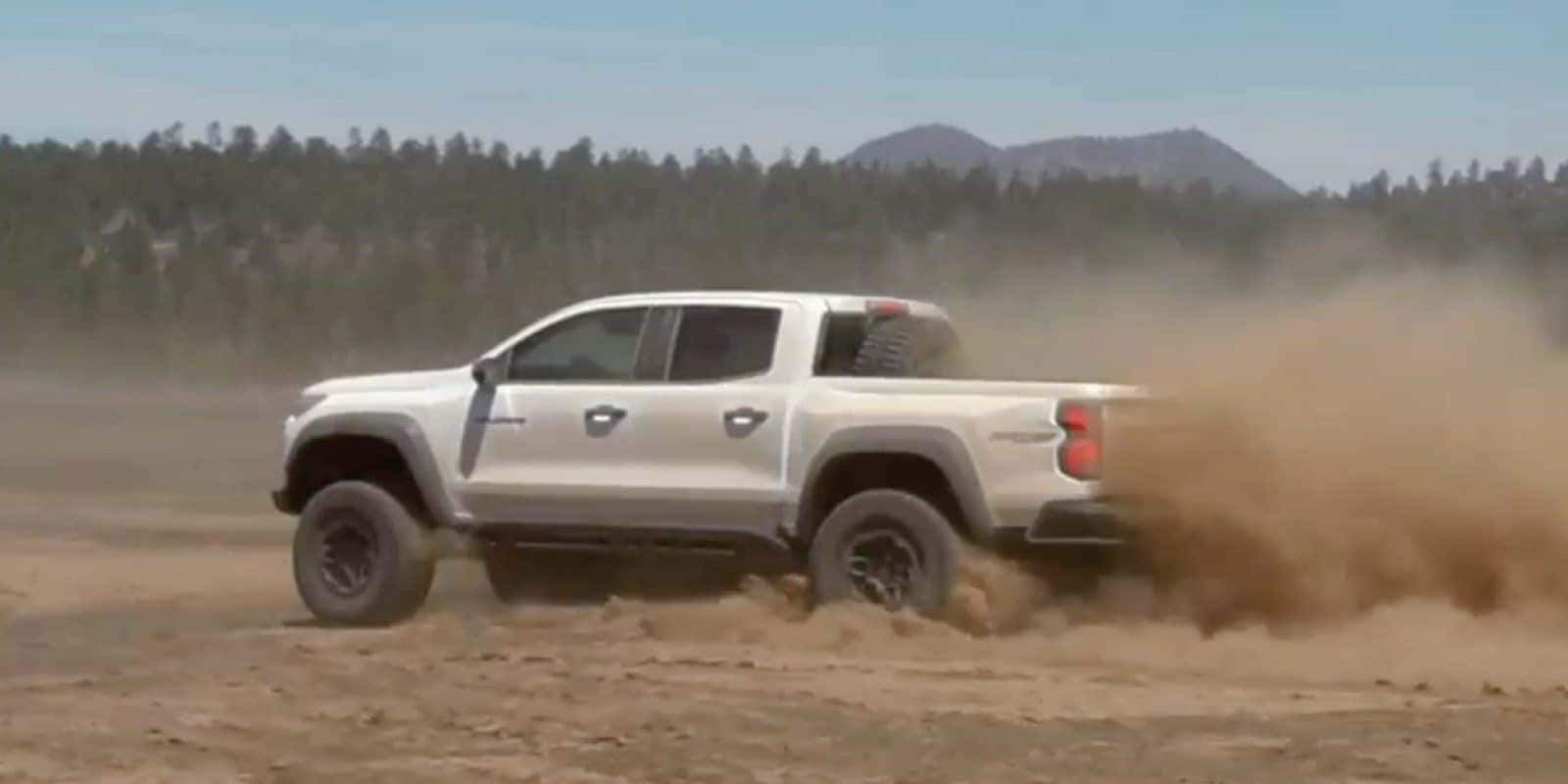 2026 Chevy Colorado ZR2 Bison kicking up dust off-road