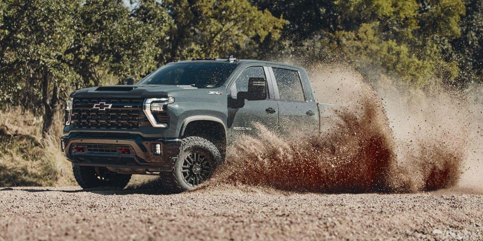 2026 Chevy Silverado HD ZR2 kicking up dirt off-road