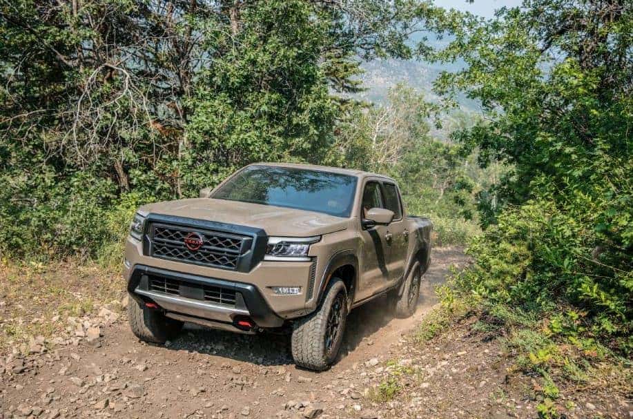 2022 Nissan Frontier Driving Down Dirt Road