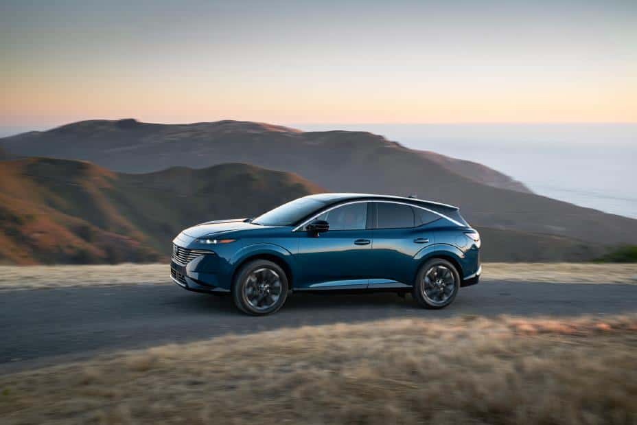 2026 Nissan Murano Most Dependable SUV | Phot Courtesy: Nissan 2026 Nissan Murano drives up hill with ocean in background