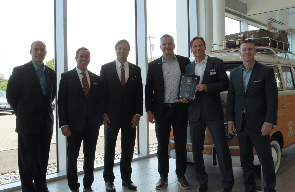 Group photo at Kelly Volkswagen | Wolfsburg Crest Award