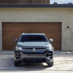 New 2027 VW Atlas Cross Sport parked in driveway