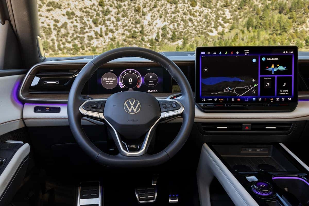 2027 Volkswagen Atlas cockpit with digital instrument cluster and touchscreen