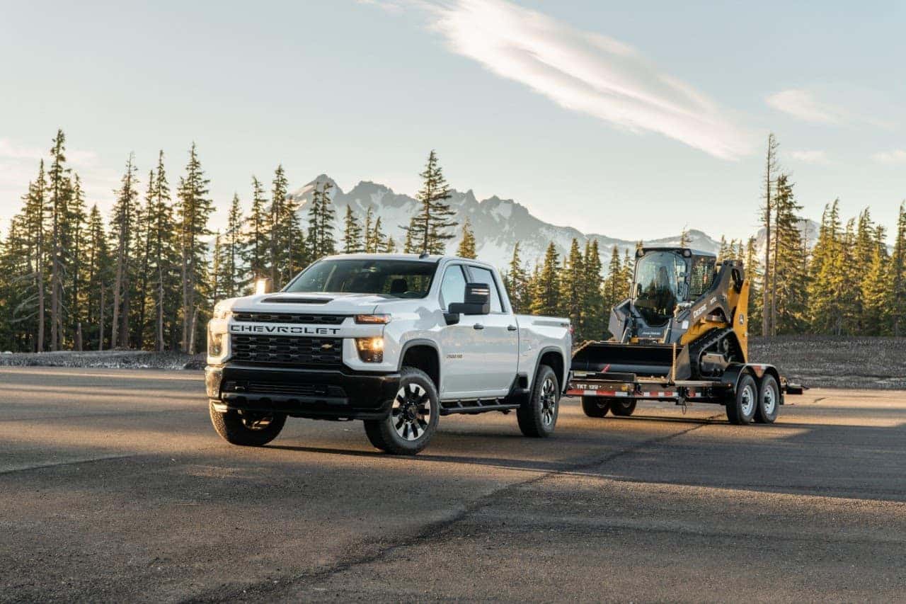 2020 Chevrolet Silverado 2500HD hauling construction equipment