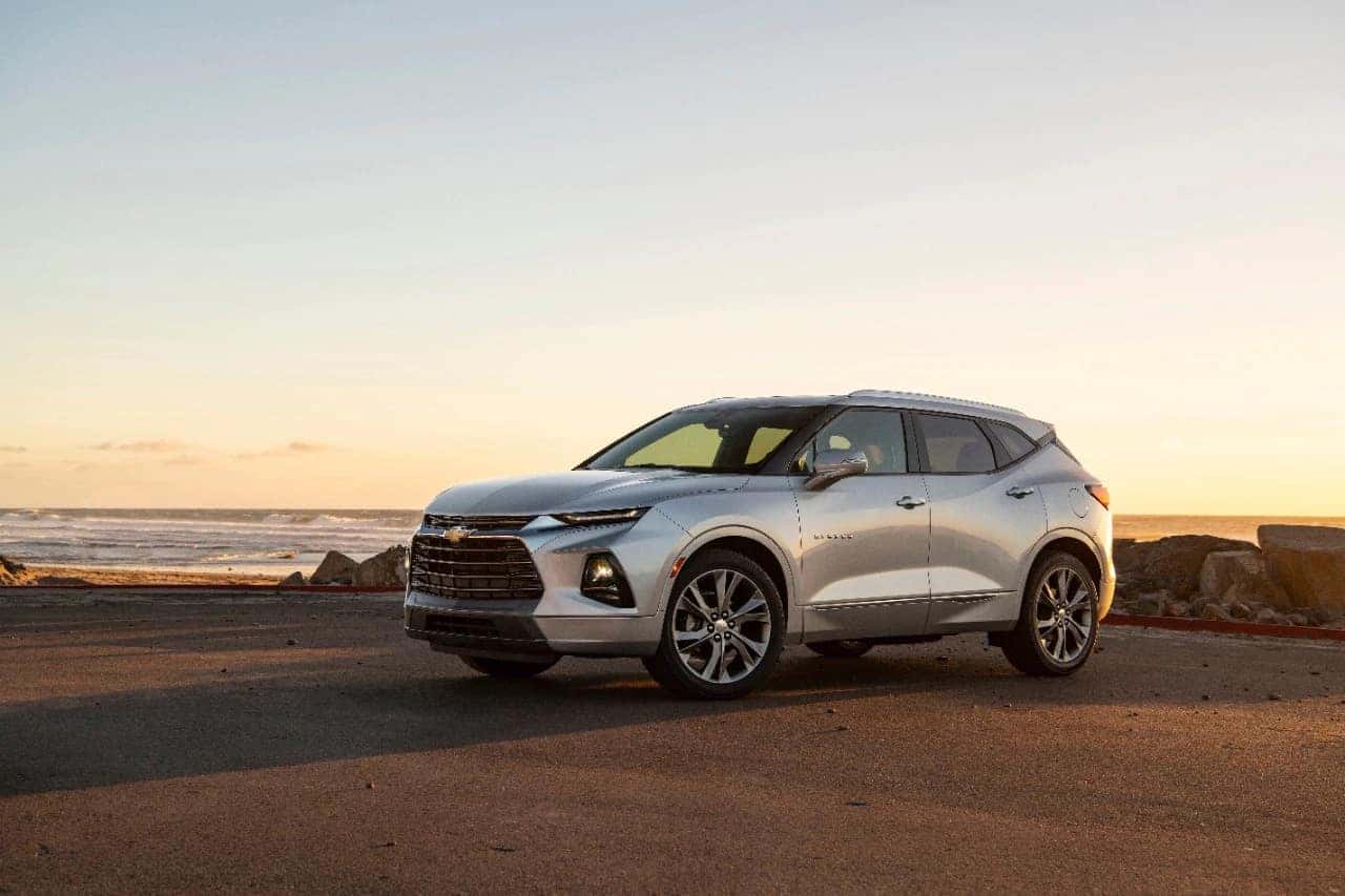 vehicle in front of a sunset