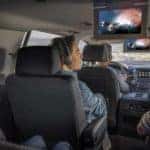 family watching movies with in car entertainment