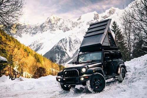 Jeep in the snow on a mountain