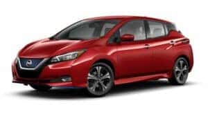 A red 2021 Nissan LEAF is angled left.
