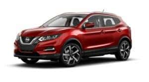 A red 2021 Nissan Rogue Sport is angled left.
