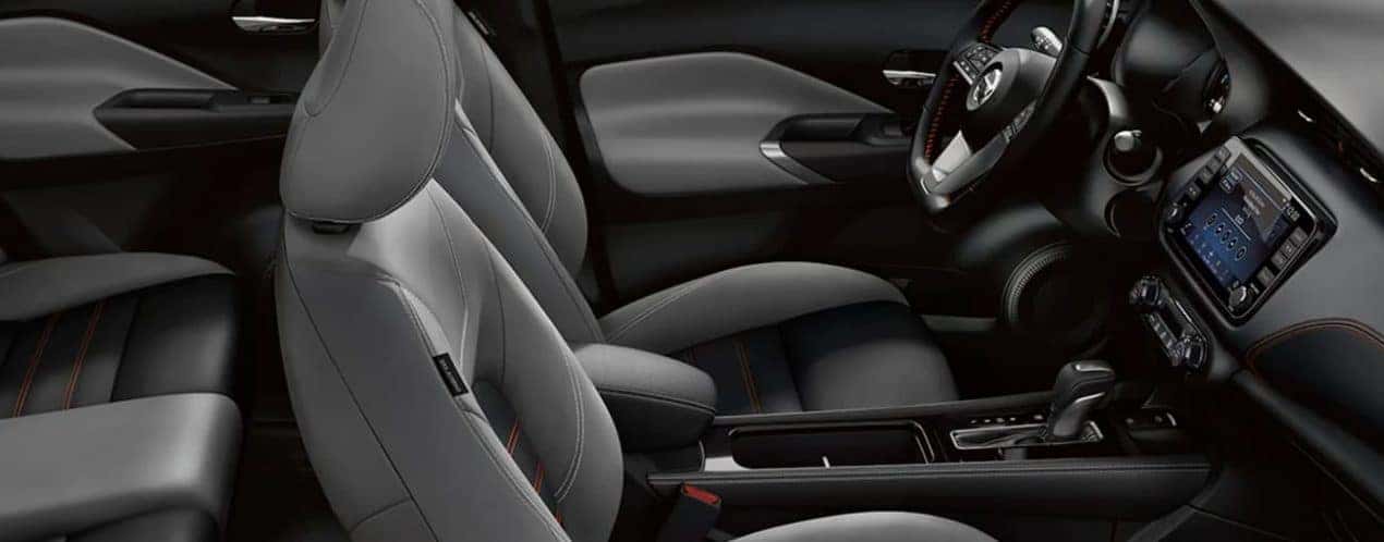 The grey and black interior is shown in a 2021 Nissan Kicks.