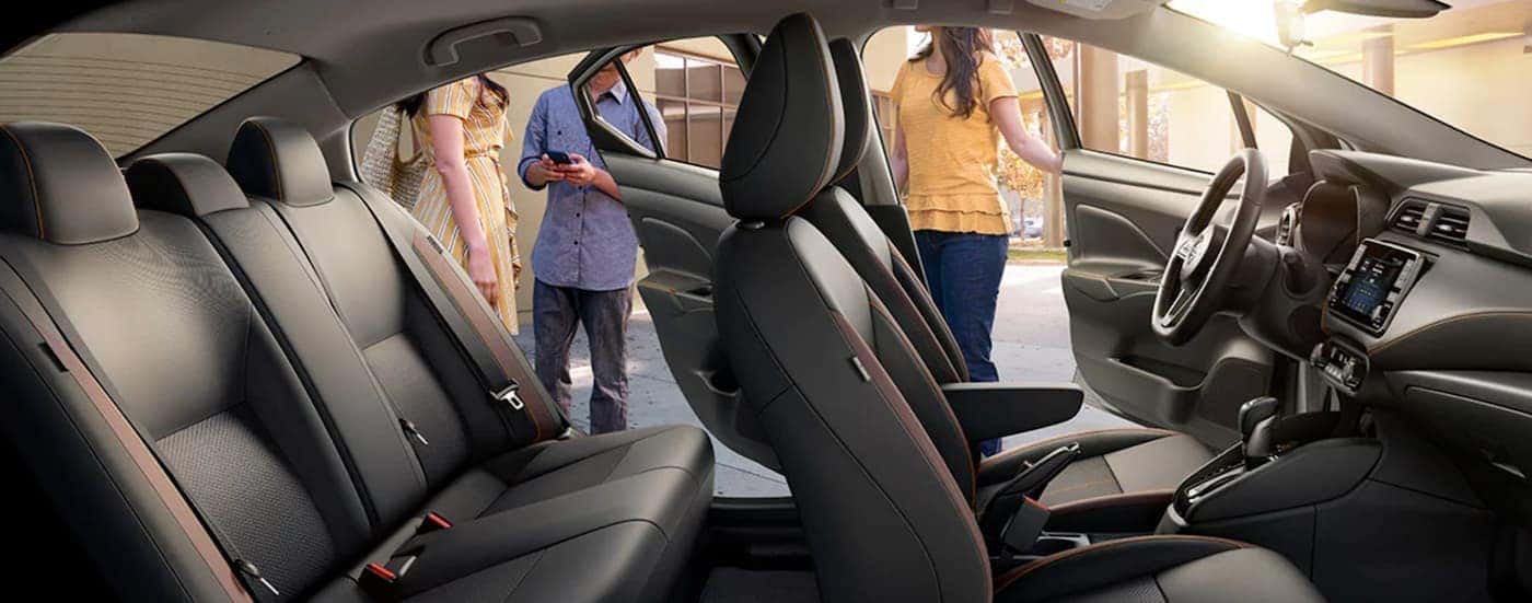 The interior of a 2021 Nissan Versa is shown at a car dealer near you.