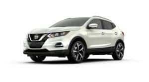 A white 2022 Nissan Rogue Sport is angled left.