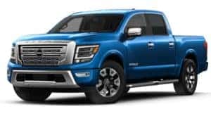 A blue 2023 Nissan Titan is shown angle left.