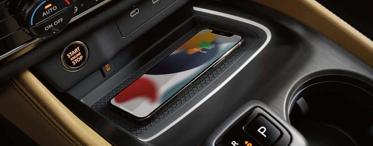 A close up of the center console charging station in a 2023 Nissan Rogue is shown.