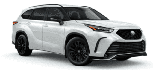 A white 2023 Toyota Highlander is shown angled left.