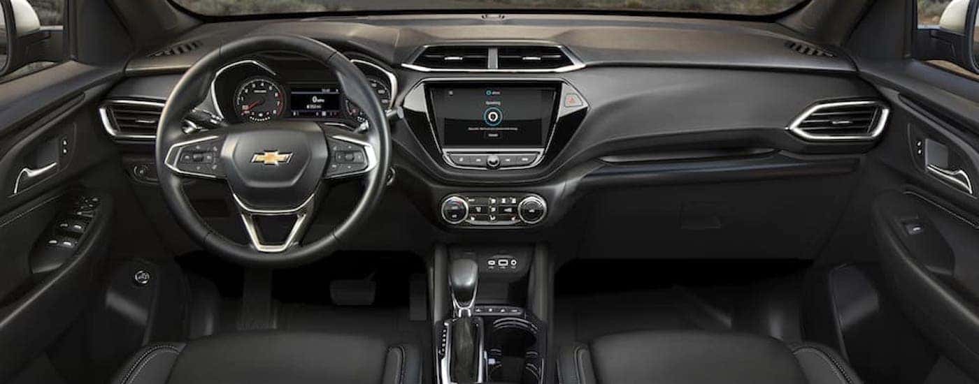 The black interior of a 2023 Chevy Trailblazer is shown from above the center console.