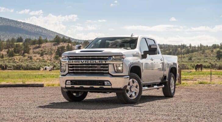 A silver 2022 Chevy Silverado 2500 HD is shown from the front at an angle.
