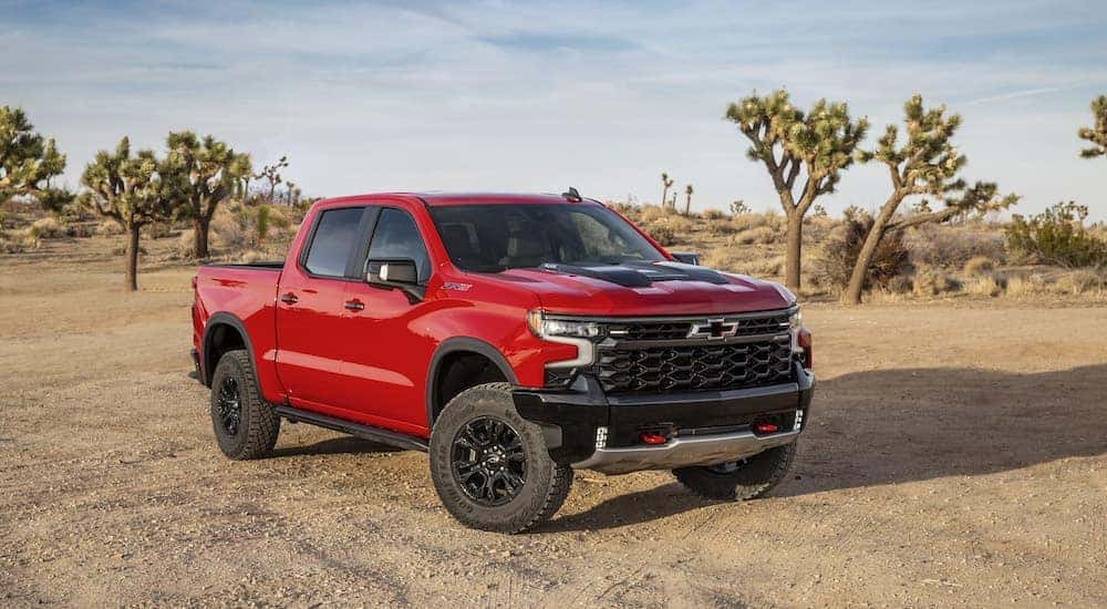 A red 2022 Chevy Silverado 1500 ZR2 is shown from the front at an angle after leaving a dealer that has a used Chevy Silverado for sale near Swartz.