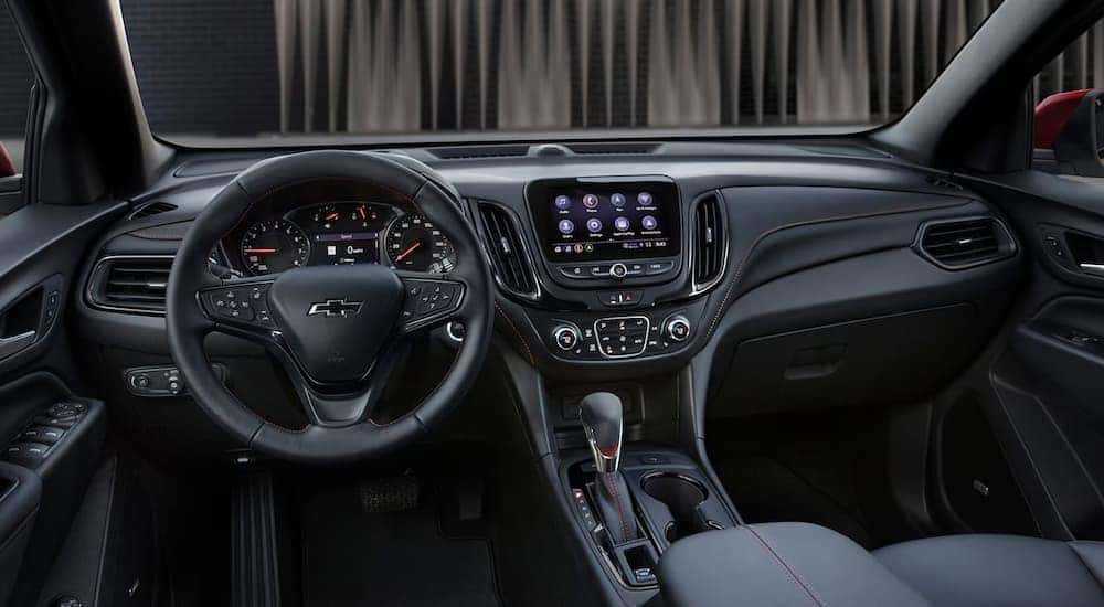 The black interior of a 2024 Chevy Equinox RS for sale.