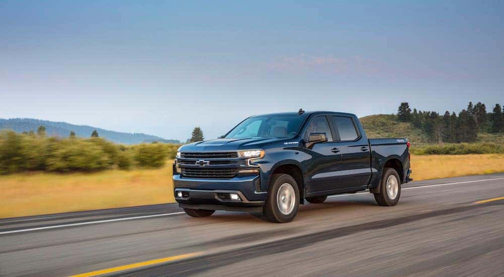 A blue 2019 Chevy Silverado 1500 RST is shown from the front at an angle.