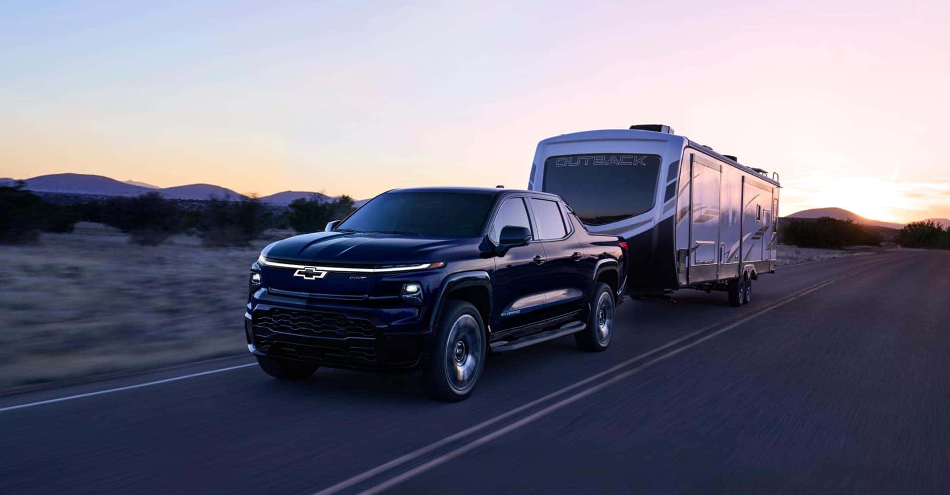 2025 Chevrolet Silverado EV hauling camper