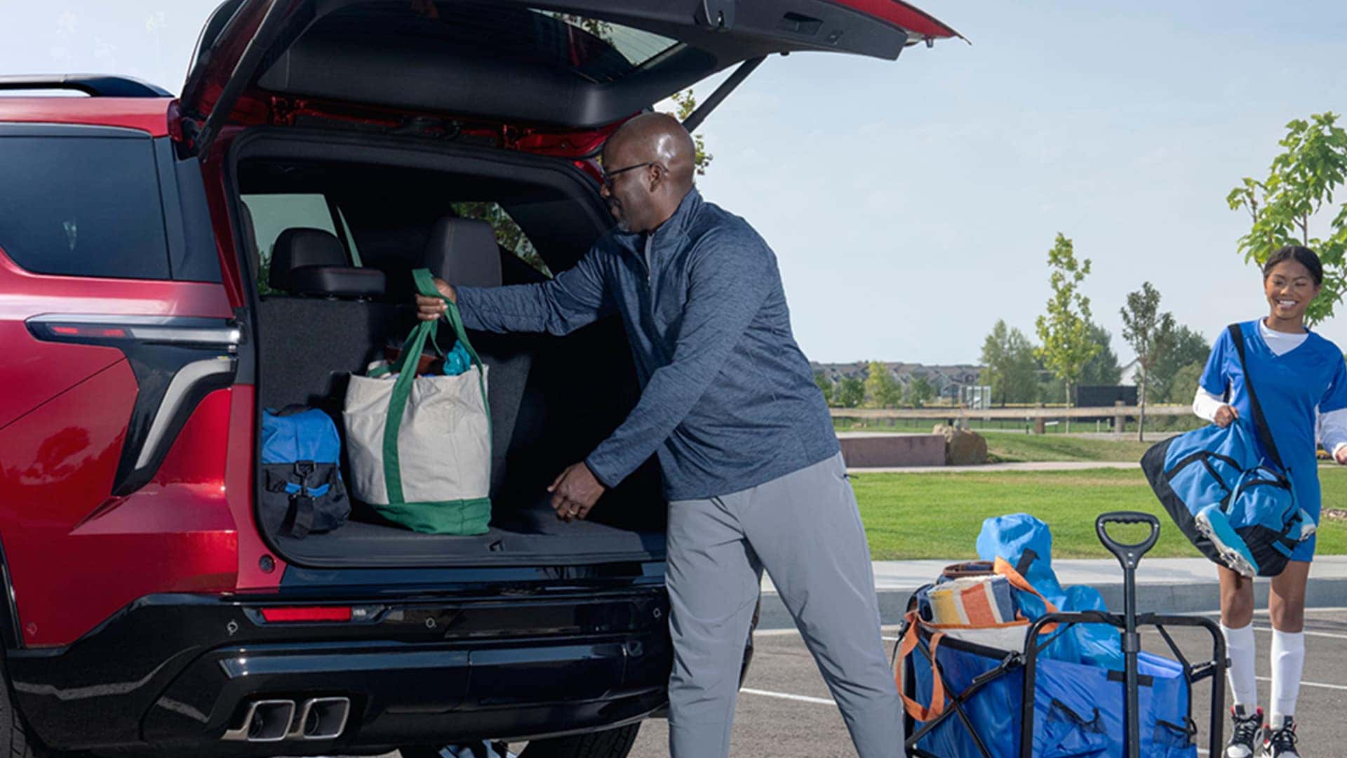 Man-Loading-Things-into-Trunk-of-Vehicle