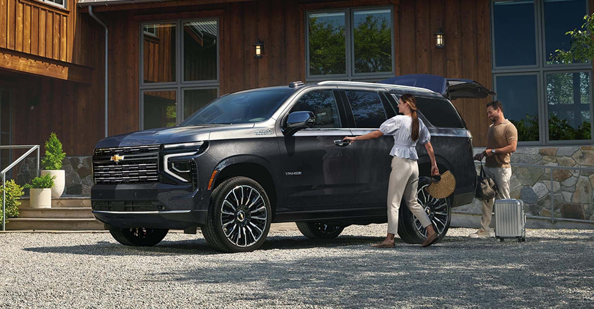 2025 Chevrolet Tahoe side with family