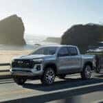 2025 Chevy Colorado Pulling a trailer on a coastal highway