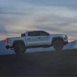2025 Chevy Colorado scaling a hill in the high desert