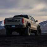 2025 Chevy Colorado exterior from the rear in front of mountains