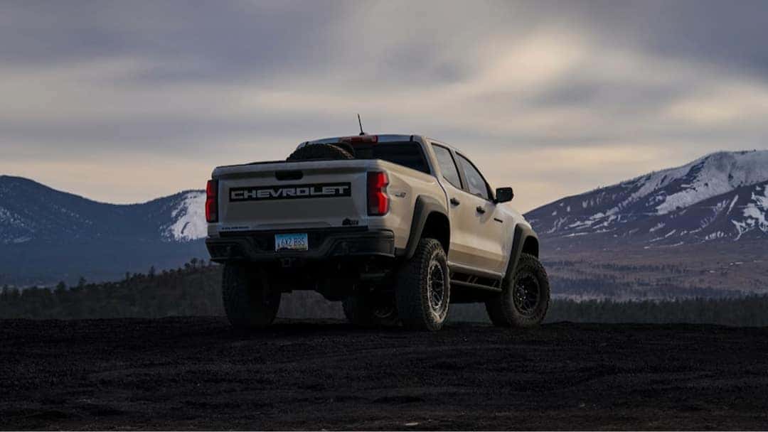 2025 Chevy Colorado exterior from the rear in front of mountains