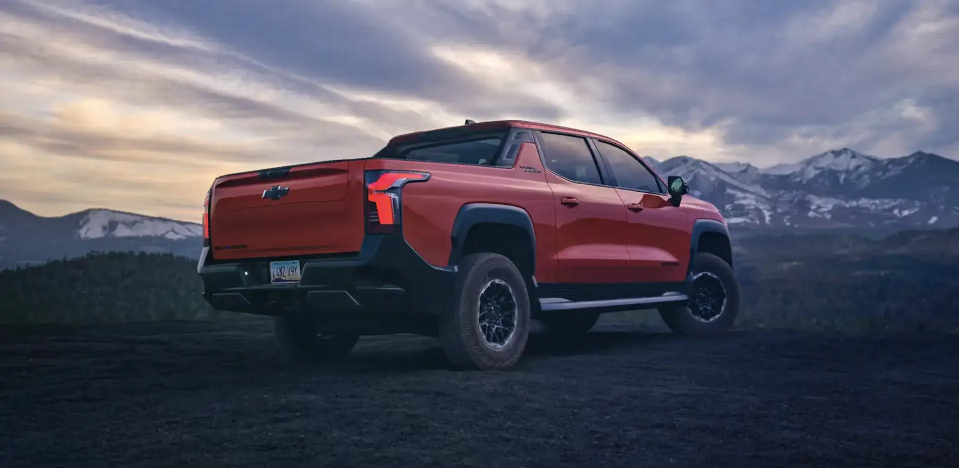 2026 Chevrolet Silverado EV parked on a cliff overlooking scenic views