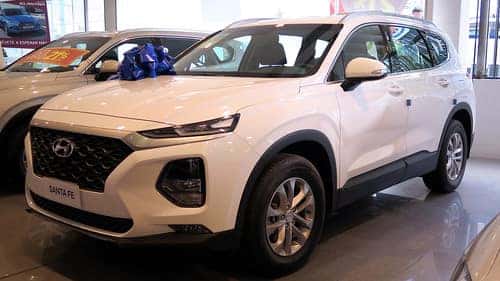 A 2019 Hyundai Santa Fe 2.4 Plus parked in a car showroom