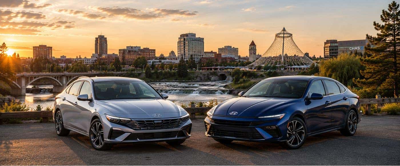 2026 Hyundai Elantra and Sonata overlooking Spokane River and downtown Spokane at sunset