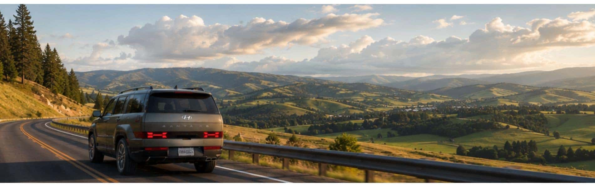 Golden-hour road across the Palouse toward Moscow