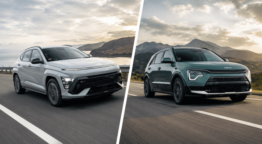 Hyundai Kona vs. Kia Niro driving on scenic roads.