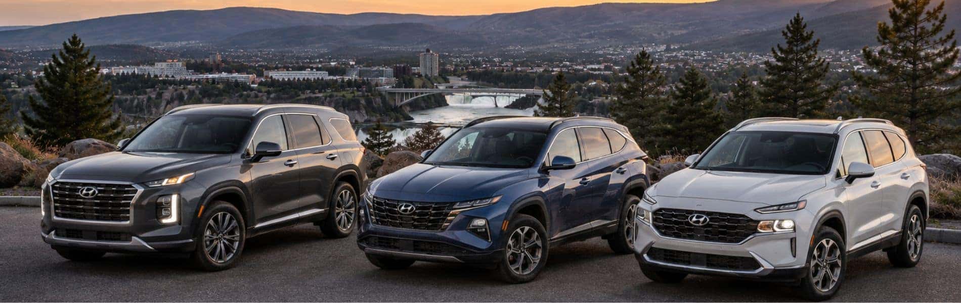 Pre-owned Hyundai vehicles overlooking Spokane at sunset