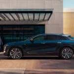 2025 Cadillac LYRIQ parked in front of a building