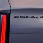 The model label "Escalade IQ" displayed in the back of the car